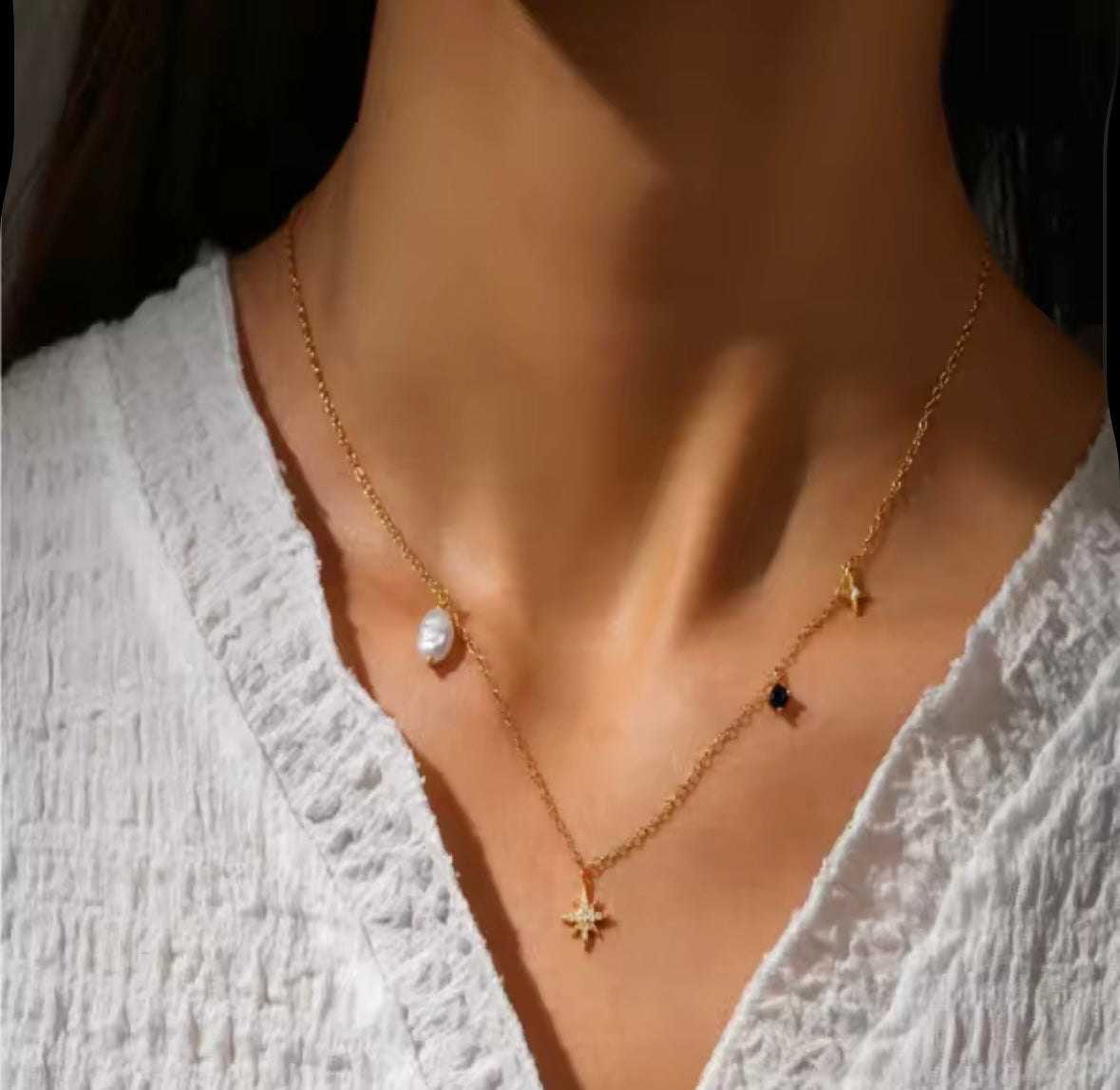 Pearl and star necklace