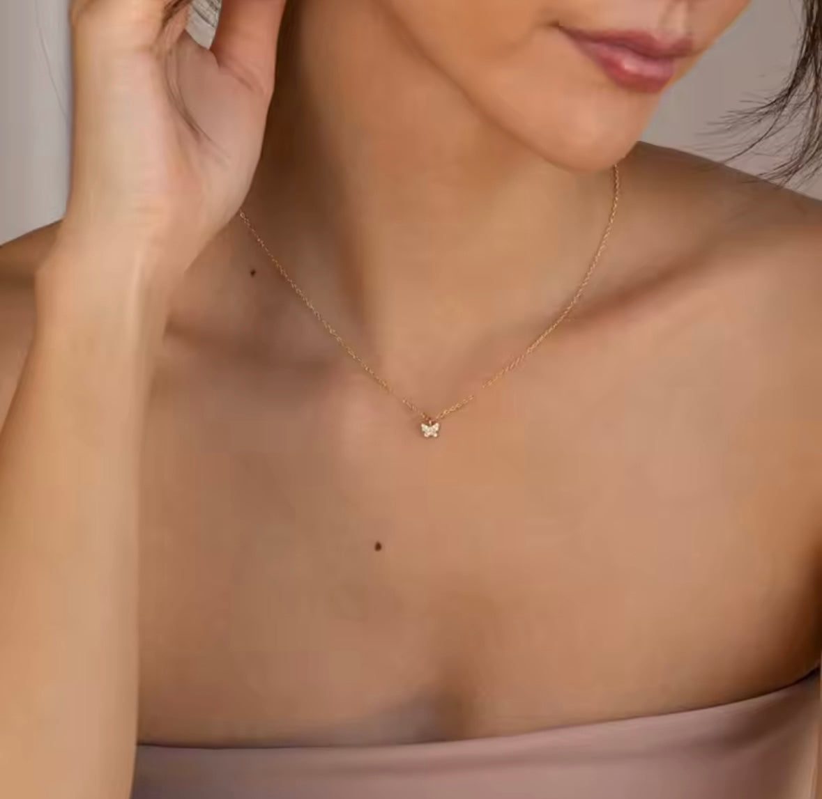 Gold butterfly necklace