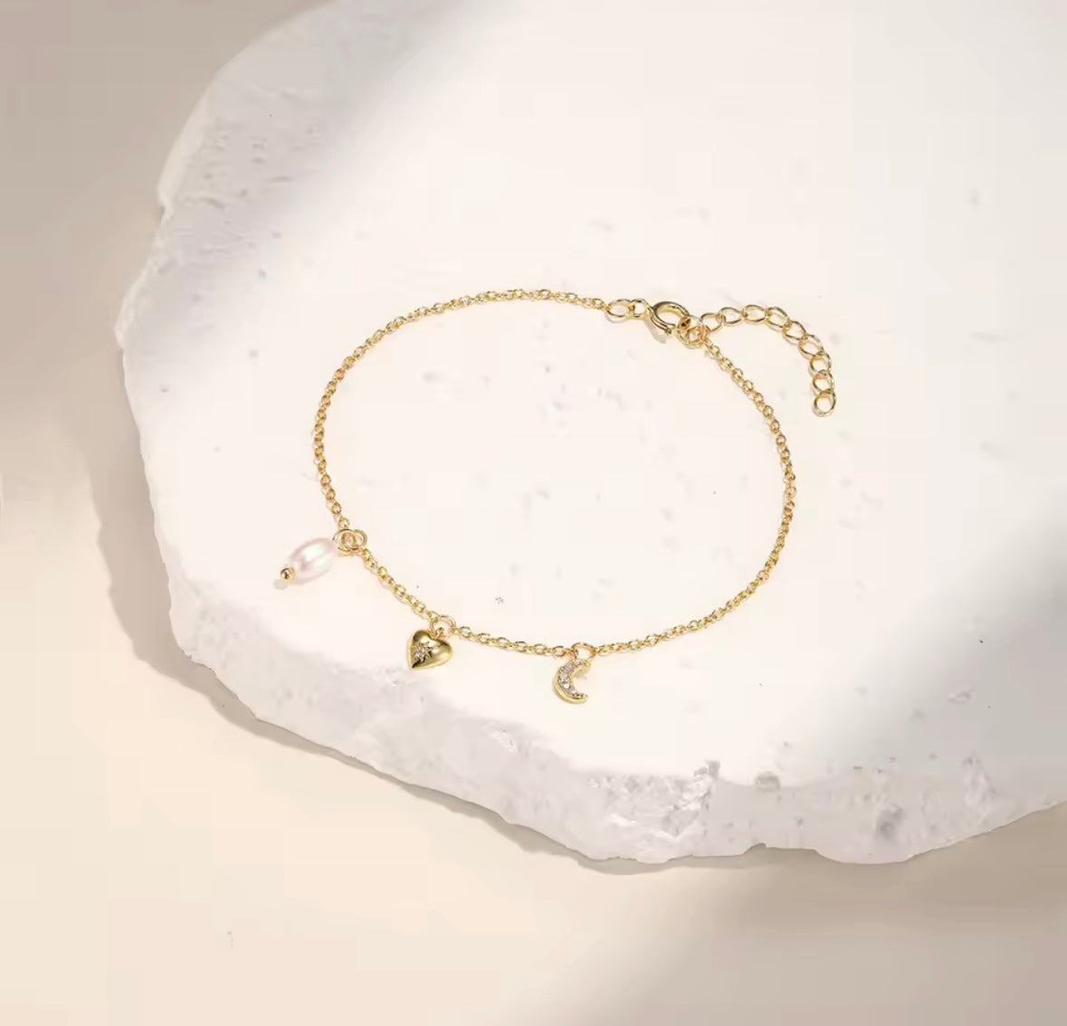 Double star and pearl charmed bracelet / pearl, heart and moon charmed bracelet