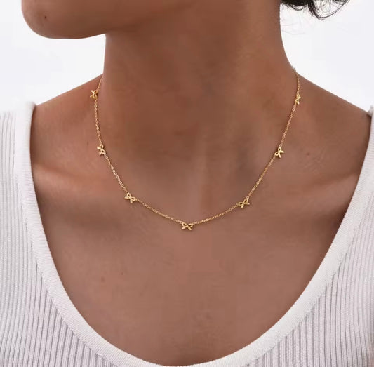 Bowknot charmed gold necklace